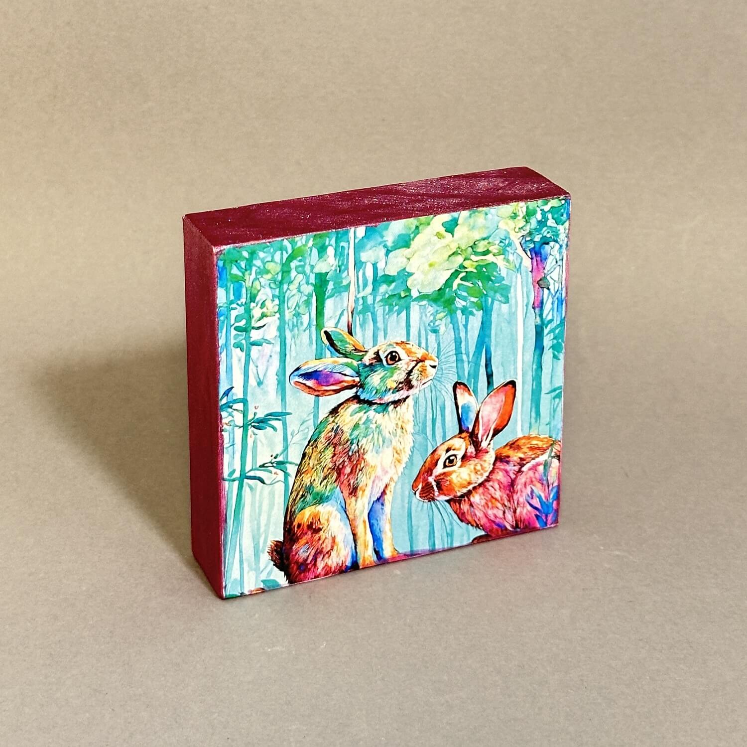 Handveredeltes Deko - Objekt: Kleines Holzbild "Ostermärchen" aus Kiefernholz 10,2 x 10,2 x 2,5 cm von ei - nzigartig