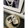Shop the Look: "Gabrielle Chanel" echte Jakobsmuschel ei-nzigartig