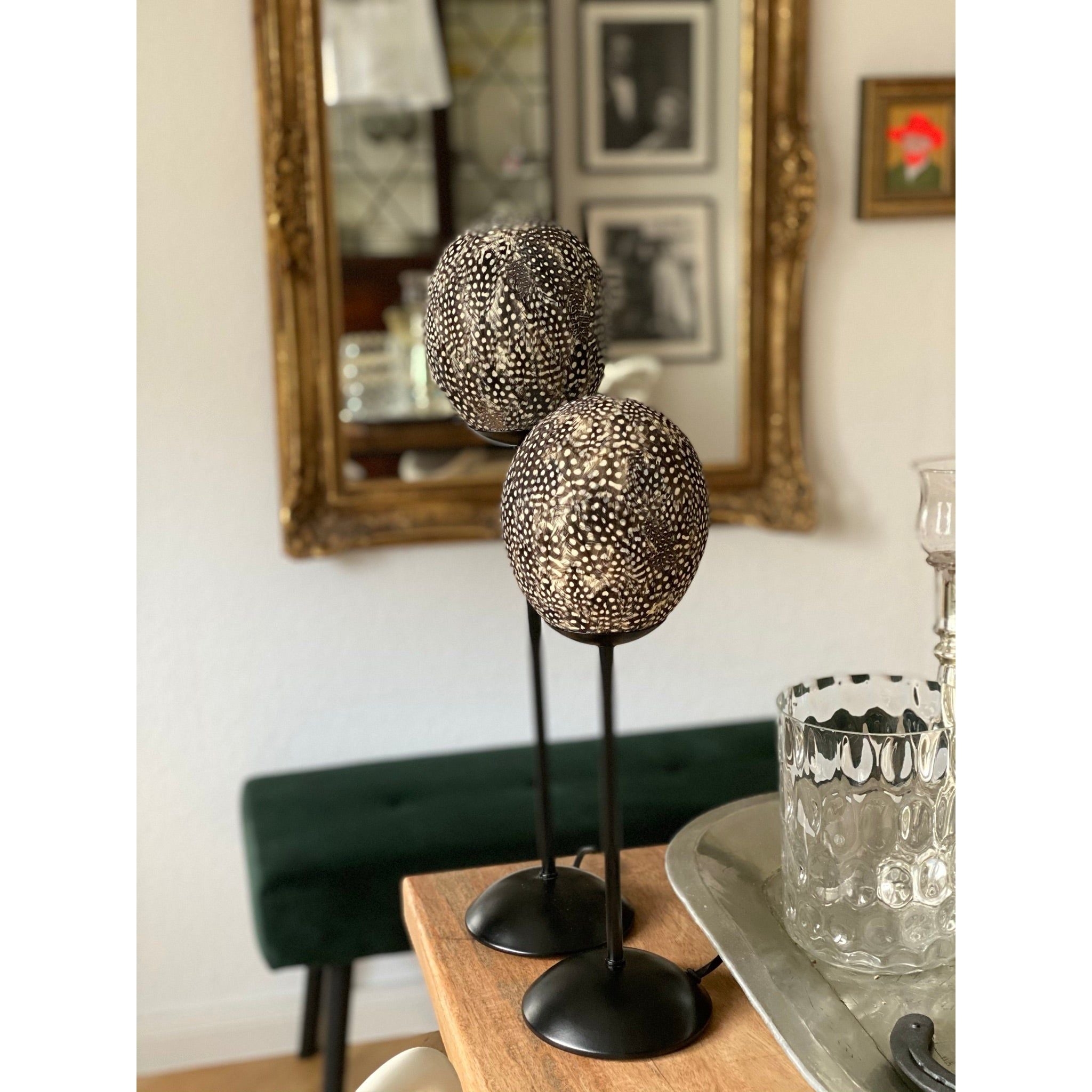 Ostrich egg lamp decorated all around with real guinea fowl feathers